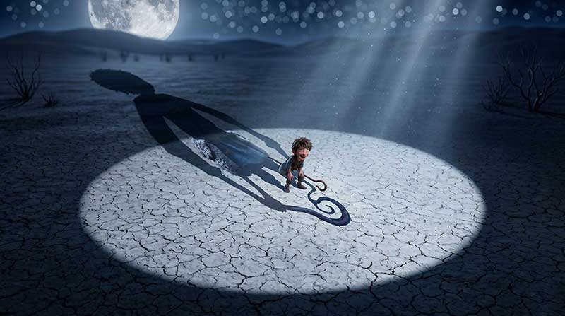 3D AI animated cinematic wide shot of Leo the shepherd boy laughing playfully while leaning on his staff under a harsh theatrical spotlight at night, standing on cracked earth while casting a massive, terrifying shadow of a wolf under a bright full moon and starry sky by Inspirious Design